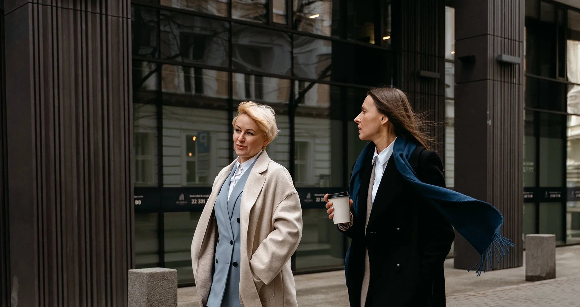 women walking talking